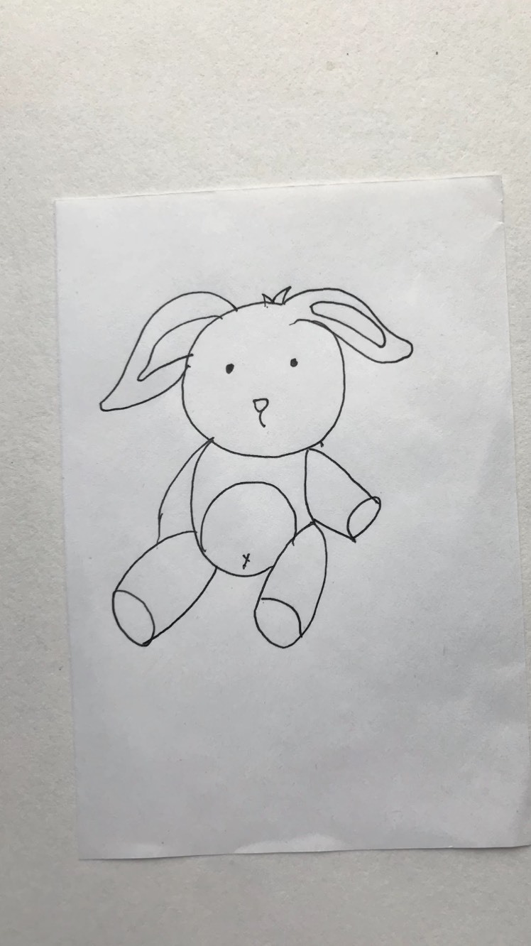 画一只坐着的兔子娃娃