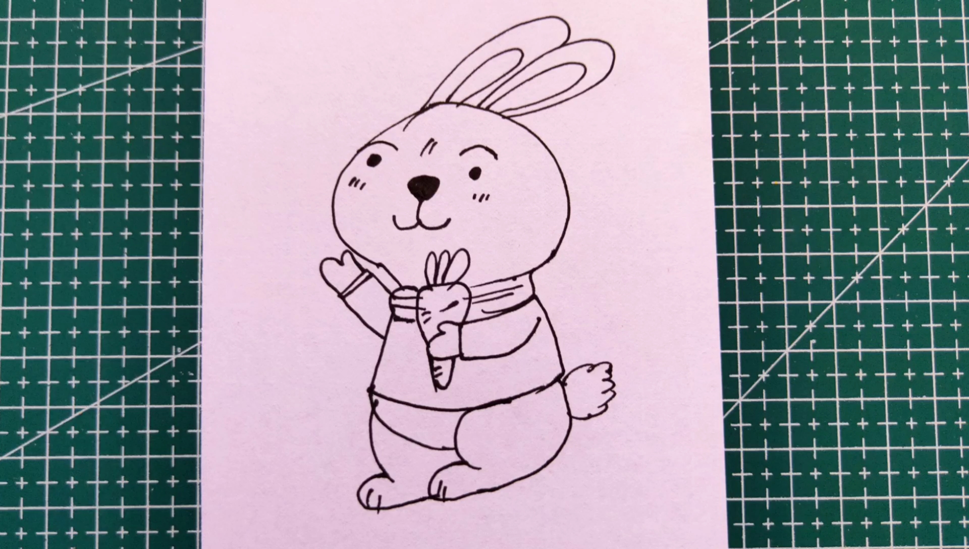 一起画一只拿着胡萝卜的大兔子