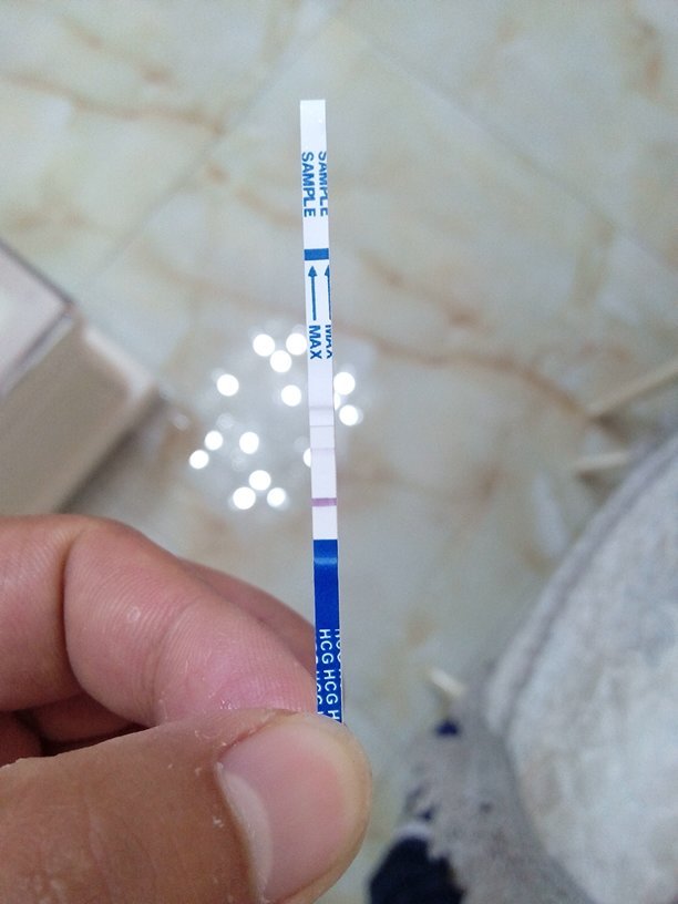 星期了今天早上我用试纸是这样的第二条线特别的浅是怀孕了吗我月经一