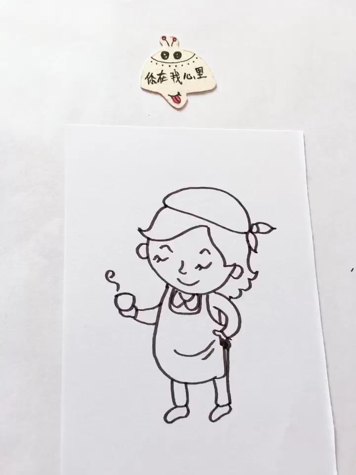 简笔画端着茶杯的女人很有气质