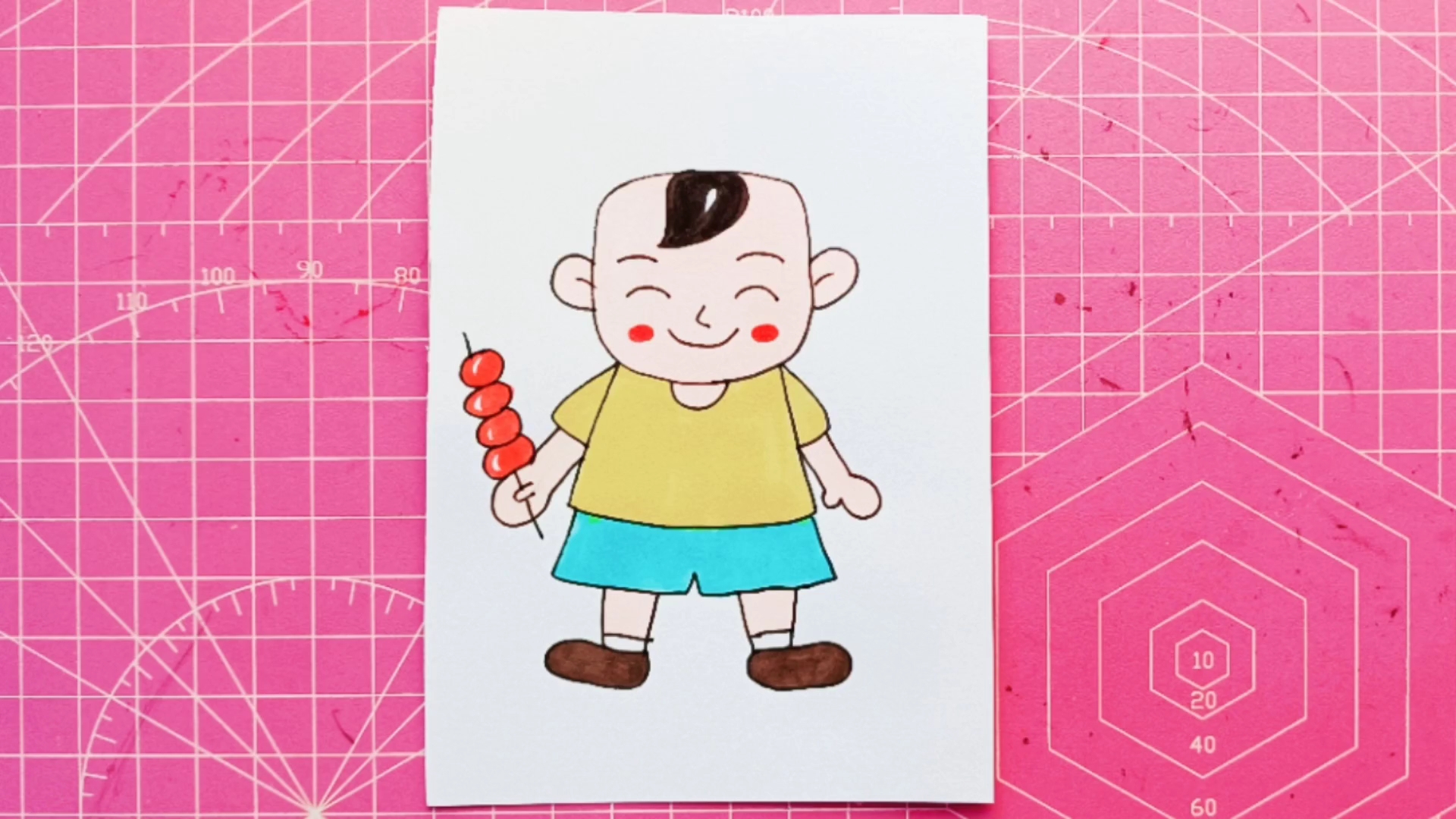 简笔画:拿糖葫芦的小男孩简笔画