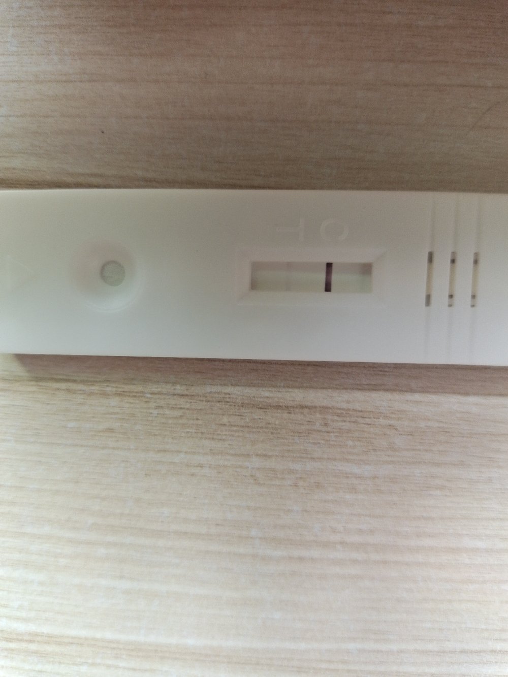 离月经期还有一天我用排卵试纸试了一下有两条杠早孕试纸有水印