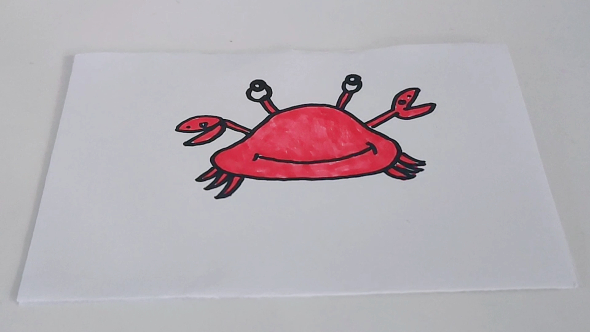 简笔画 挥着大钳子的螃蟹