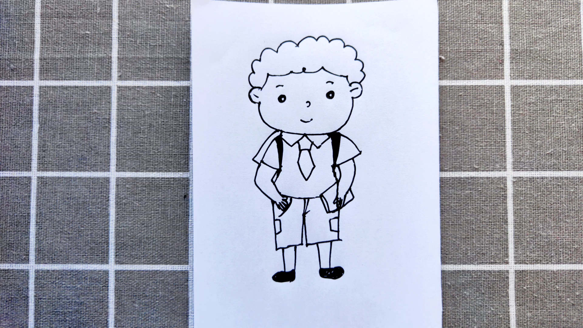 [幼儿绘画]画一个手插兜的男孩