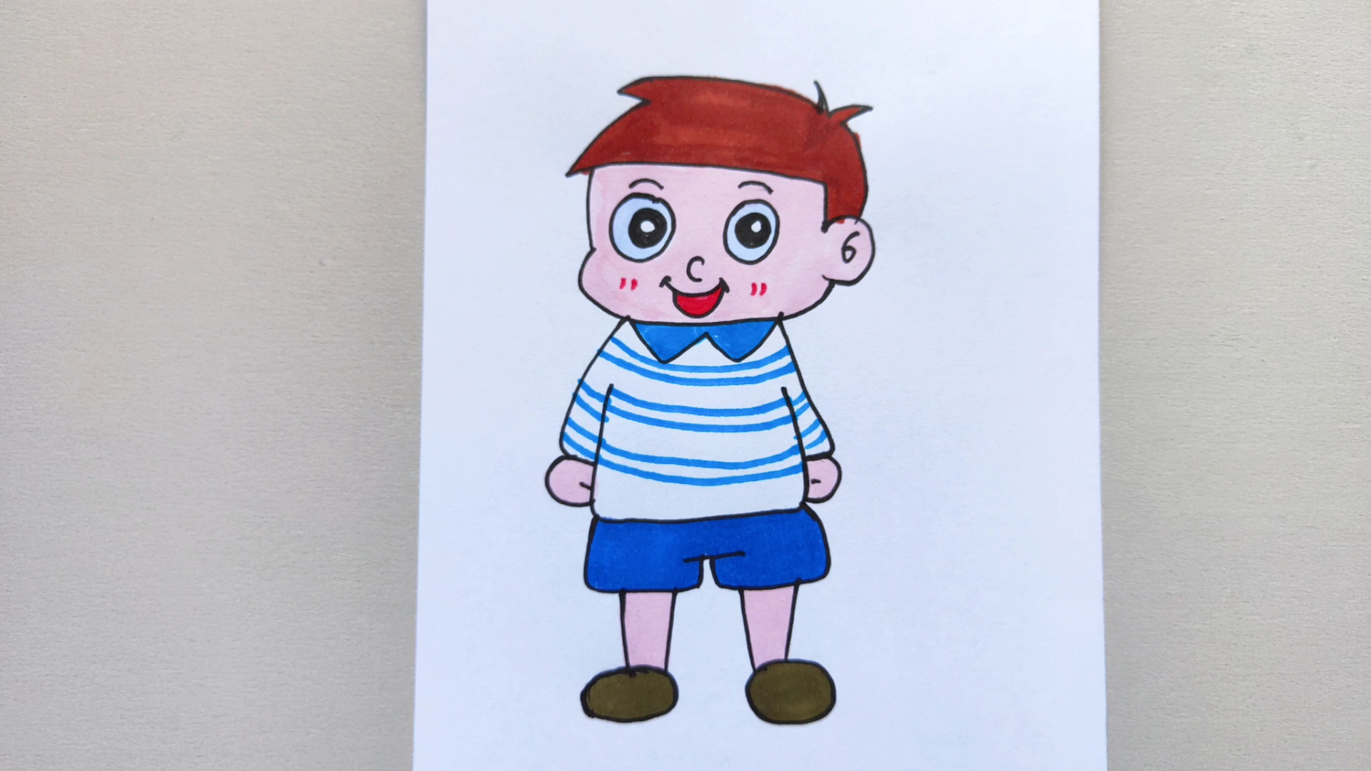 幼儿绘画一个可爱的小男孩