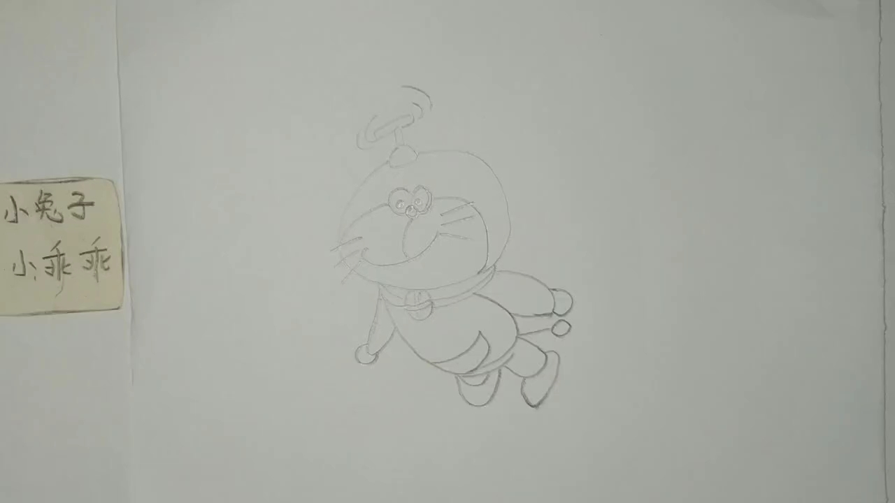 简笔画 飞着的叮当猫很自由