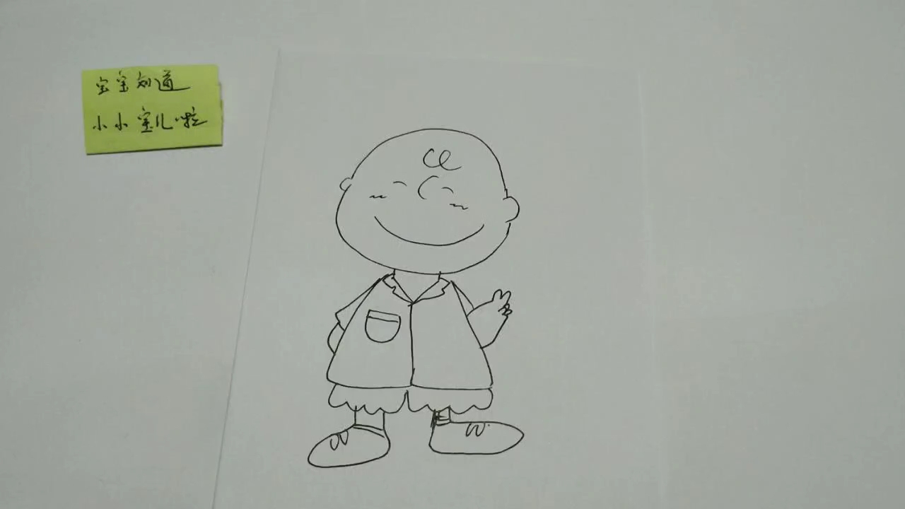 精简笔画在拍照的小孩