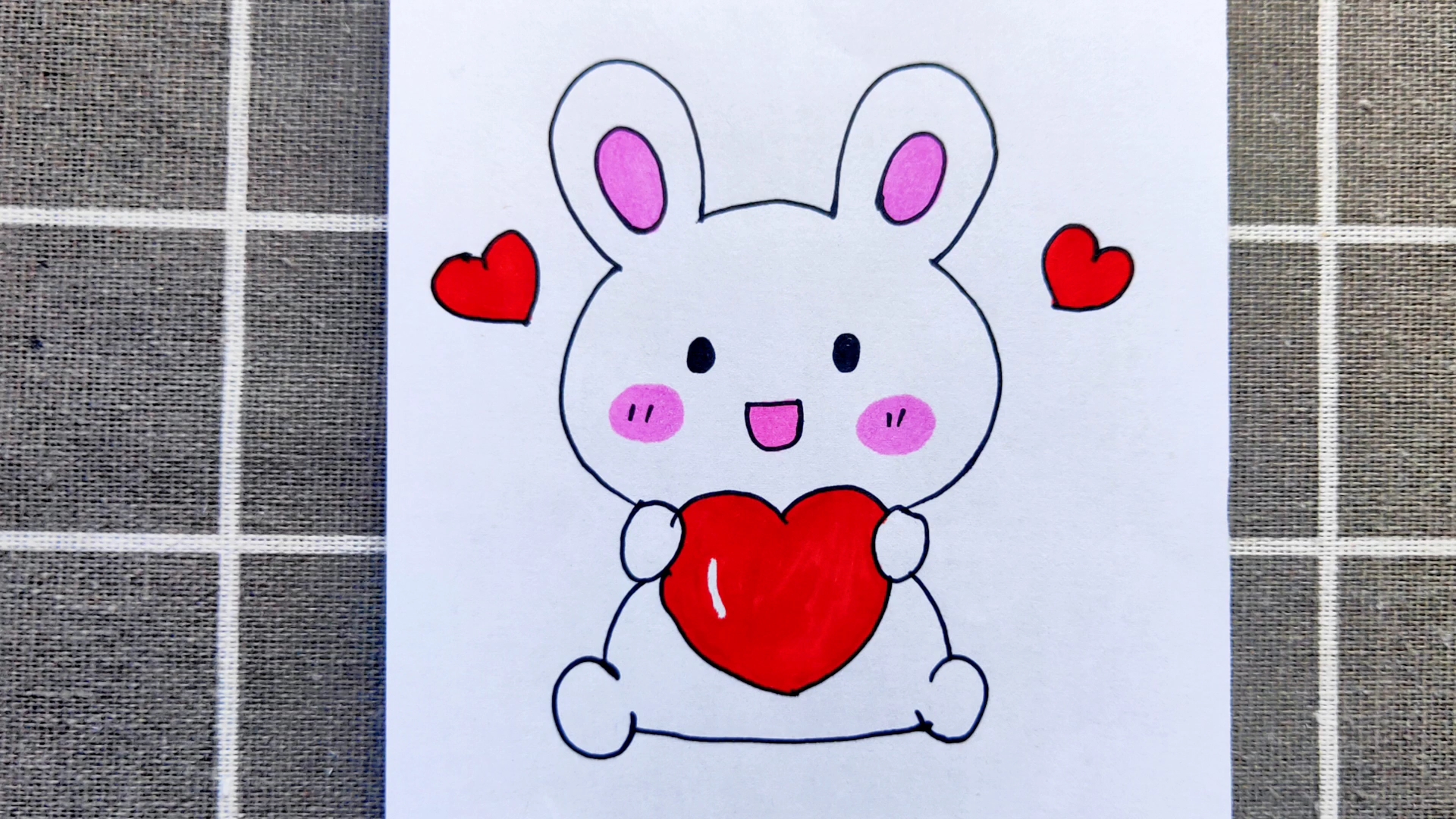 精 [幼儿绘画]画一个抱着爱心的小兔子